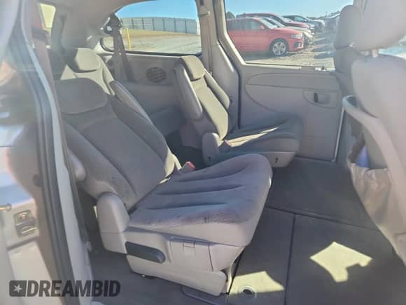 2005 Dodge Caravan SXT z VIN 2D8GP44L45R508766, wystawiony jako Copart lot #89827425 z przebiegiem Nie podano mil oraz Szkoda całkowita • Salvage title. Historia ofert i sprzedaży dostępna na DreamBid. Obrazek 11.