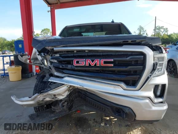2019 GMC Sierra 1500 Elevation with VIN 1GTR8CED8KZ266443, listed as a IAAI auction lot 42662811 with 115,079 mi miles and . Bid and sale history available at DreamBid. Image 13.