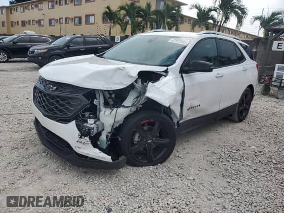 2021 Chevrolet Equinox Premier z VIN 2GNAXNEV2M6153453, wystawiony jako Copart lot #87197045 z przebiegiem 66 435 mil mil oraz Nie do naprawy • Non repairable. Historia ofert i sprzedaży dostępna na DreamBid. Obrazek 1.