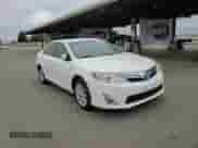 2012 Toyota Camry XLE with VIN 4T1BD1FKXCU046438, listed as a Copart auction lot 70023145 with 124,003 mi miles and Salvage title. Bid and sale history available at DreamBid. Image 14.