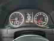 2013 Volkswagen Tiguan SE z VIN WVGAV3AX9DW056696, wystawiony jako Copart lot #54721695 z przebiegiem 108 656 mil mil oraz Szkoda całkowita • Salvage title. Historia ofert i sprzedaży dostępna na DreamBid. Obrazek 9.