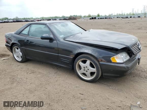 2002 Mercedes-Benz SL 500 with VIN WDBFA68F22F203120, listed as a Copart auction lot 56141525 with 144,580 mi miles and Salvage title. Bid and sale history available at DreamBid. Image 4.