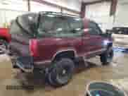 1992 Chevrolet Blazer z VIN 1GNEK18K7NJ327080, wystawiony jako Copart lot #61777315 z przebiegiem 132 687 mil mil oraz Nie do naprawy • Non repairable. Historia ofert i sprzedaży dostępna na DreamBid. Obrazek 3.