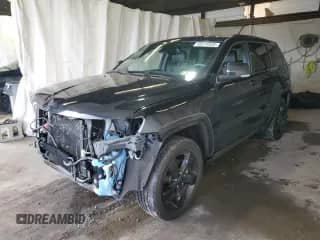 2015 Jeep Grand Cherokee Overland с VIN 1C4RJFCG8FC197684, выставлен на аукционе Copart как лот 85574935 с пробегом Не указан миль и Списание • Salvage title. История ставок и продаж доступна на DreamBid. Изображение 1.