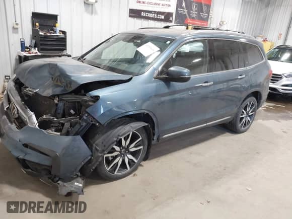 2019 Honda Pilot Touring 7-Passenger with VIN 5FNYF6H64KB004134, listed as a IAAI auction lot 43353616 with 92,735 mi miles and . Bid and sale history available at DreamBid. Image 18.
