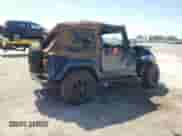 2003 Jeep Wrangler X z VIN 1J4FA39S43P357281, wystawiony jako Copart lot #67979335 z przebiegiem Nie podano mil oraz Szkoda całkowita • Salvage title. Historia ofert i sprzedaży dostępna na DreamBid. Obrazek 3.