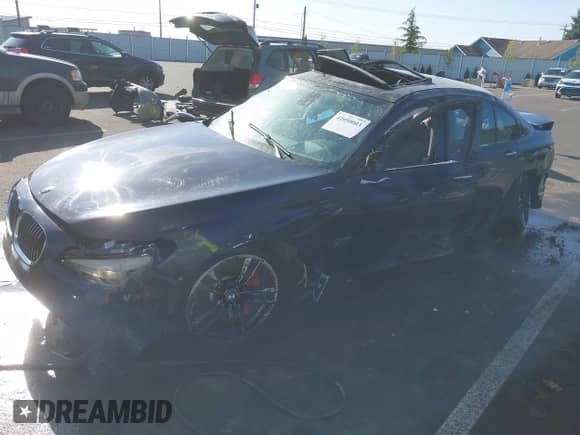 2012 BMW 7 Series 750i with VIN WBAKA8C55CCY37886, listed as a IAAI auction lot 42050003 with 86,722 mi miles and . Bid and sale history available at DreamBid. Image 2.
