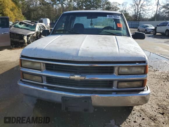 1995 GMC Sierra 1500 z VIN 2GTEC19K4S1556679, wystawiony jako Copart lot #86879064 z przebiegiem 399 030 mil mil oraz Szkoda całkowita • Salvage title. Historia ofert i sprzedaży dostępna na DreamBid. Obrazek 5.