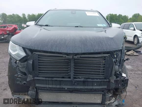 2021 Chevrolet Equinox Premier with VIN 3GNAXXEV2MS119820, listed as a IAAI auction lot 42276465 with 59,115 mi miles and . Bid and sale history available at DreamBid. Image 13.