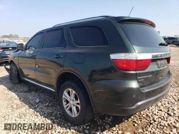 2011 Dodge Durango Crew with VIN 1D4RE4GG1BC653928, listed as a Copart auction lot 63946705 with 114,203 mi miles and Salvage title. Bid and sale history available at DreamBid. Image 2.