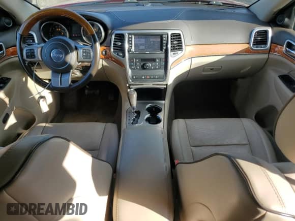 2012 Jeep Grand Cherokee Overland z VIN 1C4RJFCG6CC264603, wystawiony jako Copart lot #85195365 z przebiegiem 158 012 mil mil oraz Szkoda całkowita • Salvage title. Historia ofert i sprzedaży dostępna na DreamBid. Obrazek 8.