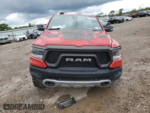 2020 Ram 1500 Rebel z VIN 1C6SRFLT5LN142849, wystawiony jako Copart lot #70570685 z przebiegiem 63 406 mil mil oraz Szkoda całkowita • Salvage title. Historia ofert i sprzedaży dostępna na DreamBid. Obrazek 5.
