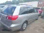 2009 Toyota Sienna XLE with VIN 5TDZK22C79S257834, listed as a IAAI auction lot 43212146 with 184,750 mi miles and . Bid and sale history available at DreamBid. Image 4.