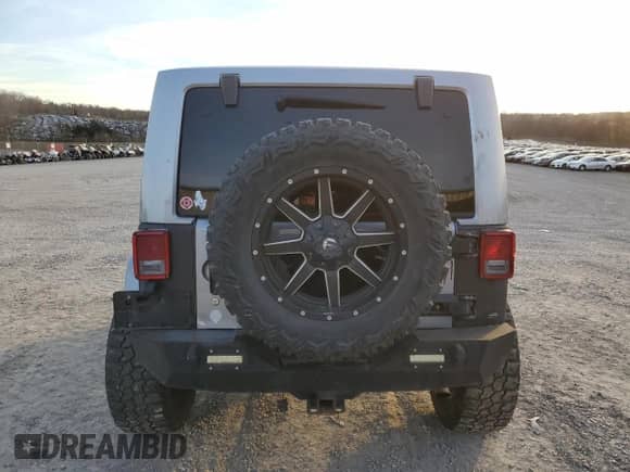 2013 Jeep Wrangler Rubicon with VIN 1C4BJWCG6DL616484, listed as a Copart auction lot 80236254 with 202,212 mi miles and Salvage title. Bid and sale history available at DreamBid. Image 6.