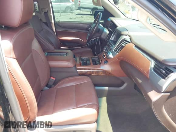 2018 Chevrolet Suburban Premier z VIN 1GNSKJKC9JR140584, wystawiony jako IAAI lot #42597418 z przebiegiem 117 662 mil mil oraz . Historia ofert i sprzedaży dostępna na DreamBid. Obrazek 5.