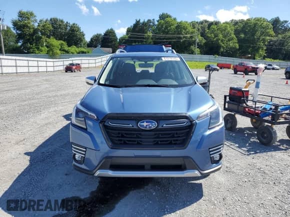 2023 Subaru Forester Touring z VIN JF2SKARC8PH545785, wystawiony jako Copart lot #61219105 z przebiegiem 9 841 mil mil oraz Szkoda całkowita • Salvage title. Historia ofert i sprzedaży dostępna na DreamBid. Obrazek 5.