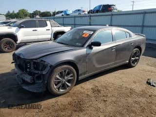 2023 Dodge Charger SXT with VIN 2C3CDXJG8PH666815, listed as a Copart auction lot 68099385 with 11,717 mi miles and Salvage title. Bid and sale history available at DreamBid. Image 1.