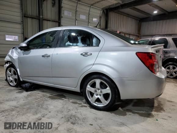 2013 Chevrolet Sonic LTZ with VIN 1G1JE5SH6D4102528, listed as a Copart auction lot 47419475 with 129,812 mi miles and Salvage title. Bid and sale history available at DreamBid. Image 2.