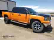 2007 GMC Sierra 1500 SLT with VIN 2GTEC13J771633410, listed as a Copart auction lot 60505515 with 194,627 mi miles and Salvage title. Bid and sale history available at DreamBid. Image 4.