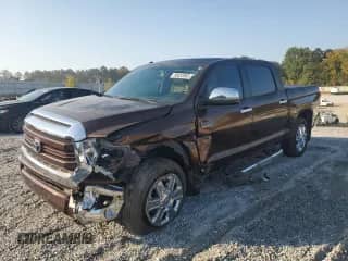 2014 Toyota Tundra 1794 Edition with VIN 5TFGY5F14EX164984, listed as a Copart auction lot 80433565 with 122,982 mi miles and Salvage title. Bid and sale history available at DreamBid. Image 1.