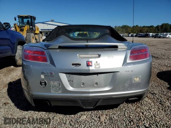 2009 Saturn Sky Red Line с VIN 1G8MT35X59Y104413, выставлен на аукционе Copart как лот 84166785 с пробегом 82 261 миль миль и Списание • Salvage title. История ставок и продаж доступна на DreamBid. Изображение 6.
