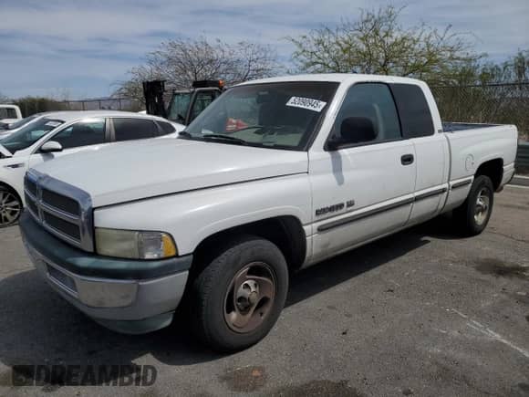 1999 Dodge 1500 with VIN 3B7HC13Z4XG127818, listed as a Copart auction lot 52090945 with 245,977 mi miles and Clean title. Bid and sale history available at DreamBid. Image 1.