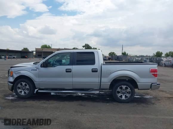 2013 Ford F-150 XL with VIN 1FTFW1CTXDFA06153, listed as a IAAI auction lot 43269175 with 153,732 mi miles and . Bid and sale history available at DreamBid. Image 14.