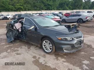 2016 Chevrolet Malibu Hybrid z VIN 1G1ZJ5SUXGF297148, wystawiony jako IAAI lot #42454695 z przebiegiem 171 078 mil mil oraz . Historia ofert i sprzedaży dostępna na DreamBid. Obrazek 1.