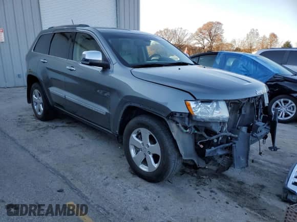 2012 Jeep Grand Cherokee Limited z VIN 1C4RJFBT3CC246526, wystawiony jako Copart lot #74776133 z przebiegiem 162 805 mil mil oraz Szkoda całkowita • Salvage title. Historia ofert i sprzedaży dostępna na DreamBid. Obrazek 4.