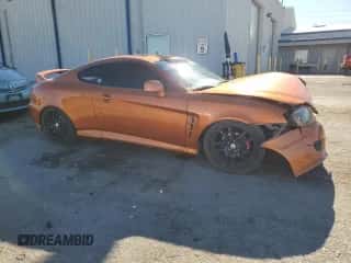 2006 Hyundai Tiburon GT с VIN KMHHN65FX6U207318, выставлен на аукционе Copart как лот 68147734 с пробегом 180 284 миль миль и Списание • Salvage title. История ставок и продаж доступна на DreamBid. Изображение 4.
