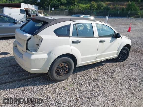 2009 Dodge Caliber SE with VIN 1B3HB28A79D200225, listed as a IAAI auction lot 42556556 with 133,492 mi miles and . Bid and sale history available at DreamBid. Image 4.