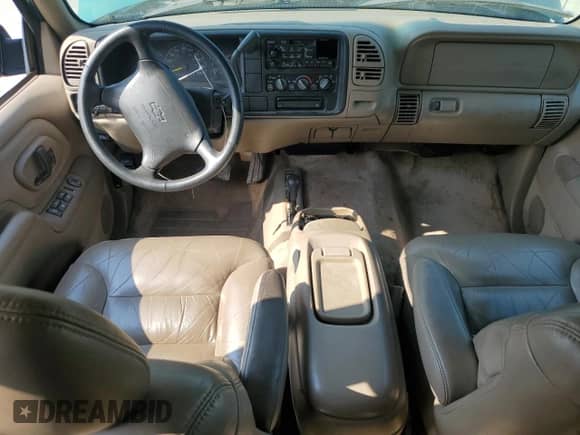 1997 Chevrolet Suburban with VIN 3GNFK16RXVG114579, listed as a Copart auction lot 57333295 with 117,040 mi miles and Salvage title. Bid and sale history available at DreamBid. Image 8.