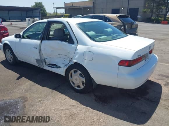 1997 Toyota Camry LE z VIN JT2BF22K6V0052184, wystawiony jako IAAI lot #42608245 z przebiegiem 188 191 mil mil oraz . Historia ofert i sprzedaży dostępna na DreamBid. Obrazek 3.