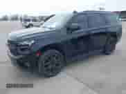 2023 Chevrolet Tahoe RST with VIN 1GNSCRKDXPR282973, listed as a IAAI auction lot 39018448 with 33,385 mi miles and . Bid and sale history available at DreamBid. Image 2.