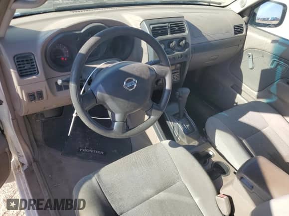 2002 Nissan Frontier XE z VIN 1N6ED26T52C366879, wystawiony jako Copart lot #67726024 z przebiegiem 141 068 mil mil oraz Szkoda całkowita • Salvage title. Historia ofert i sprzedaży dostępna na DreamBid. Obrazek 8.