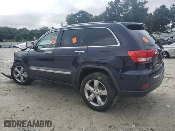 2012 Jeep Grand Cherokee Overland with VIN 1C4RJECG2CC299407, listed as a Copart auction lot 67927825 with Not provided miles and Salvage title. Bid and sale history available at DreamBid. Image 2.