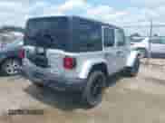 2023 Jeep Wrangler Sahara with VIN 1C4JJXP69PW695915, listed as a IAAI auction lot 42662028 with 36,957 mi miles and . Bid and sale history available at DreamBid. Image 4.