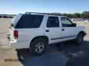2000 Chevrolet Blazer LS z VIN 1GNCS13W4YK132571, wystawiony jako Copart lot #81794244 z przebiegiem 152 253 mil mil oraz Szkoda całkowita • Salvage title. Historia ofert i sprzedaży dostępna na DreamBid. Obrazek 3.