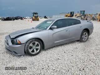 2014 Dodge Charger SE with VIN 2C3CDXBG4EH154805, listed as a Copart auction lot 82117335 with 167,959 mi miles and Salvage title. Bid and sale history available at DreamBid. Image 1.