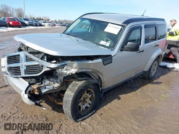 2011 Dodge Nitro SE with VIN 1D4PU2GK9BW524725, listed as a IAAI auction lot 41730468 with 166,857 mi miles and . Bid and sale history available at DreamBid. Image 2.