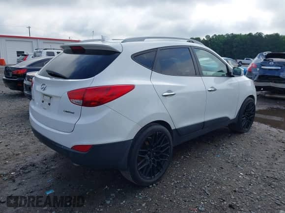 2014 Hyundai Tucson Limited z VIN KM8JU3AG2EU798972, wystawiony jako IAAI lot #42510834 z przebiegiem 269 280 mil mil oraz . Historia ofert i sprzedaży dostępna na DreamBid. Obrazek 4.