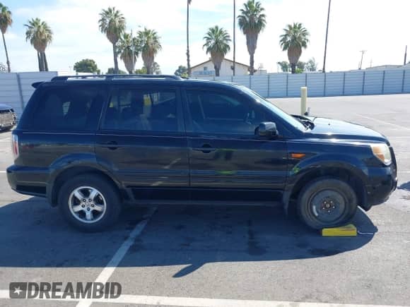 2006 Honda Pilot EX-L z VIN 5FNYF28506B016626, wystawiony jako IAAI lot #43056380 z przebiegiem 284 203 mil mil oraz . Historia ofert i sprzedaży dostępna na DreamBid. Obrazek 13.