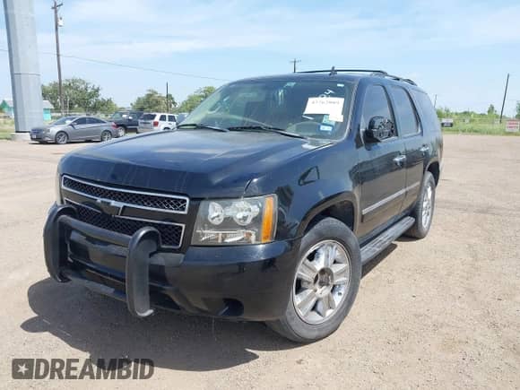 2009 Chevrolet Tahoe LTZ with VIN 1GNFC33J09R172584, listed as a IAAI auction lot 42762889 with 229,534 mi miles and . Bid and sale history available at DreamBid. Image 6.