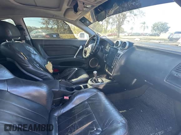 2005 Hyundai Tiburon GT с VIN KMHHN65F85U183258, выставлен на аукционе Copart как лот 83861894 с пробегом 281 902 миль миль и Чистый • Clean title. История ставок и продаж доступна на DreamBid. Изображение 5.