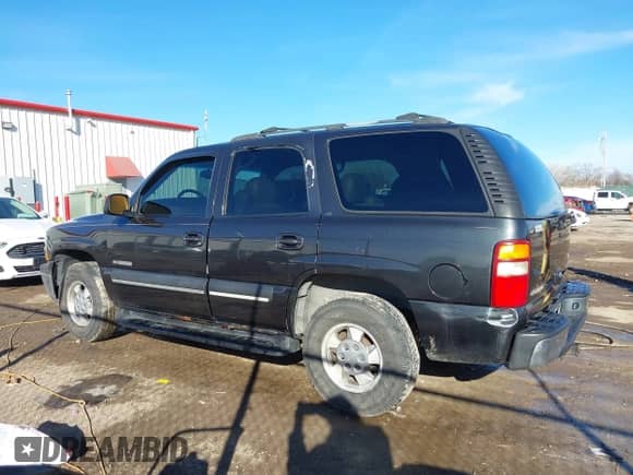2003 Chevrolet Tahoe Z71 z VIN 1GNEK13Z63R182603, wystawiony jako IAAI lot #41619467 z przebiegiem 328 469 mil mil oraz . Historia ofert i sprzedaży dostępna na DreamBid. Obrazek 14.