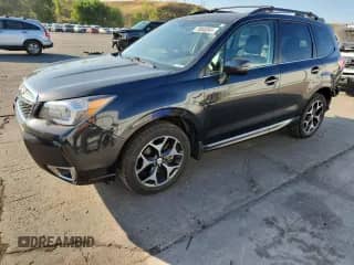 2016 Subaru Forester XT Touring z VIN JF2SJGXC4GH456384, wystawiony jako Copart lot #70045345 z przebiegiem 107 427 mil mil oraz Szkoda całkowita • Salvage title. Historia ofert i sprzedaży dostępna na DreamBid. Obrazek 1.