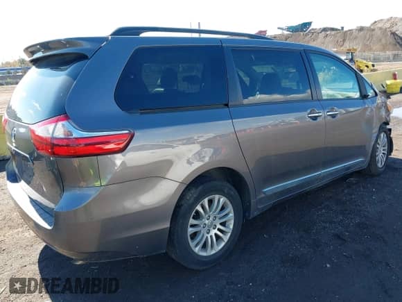 2016 Toyota Sienna XLE with VIN 5TDYK3DC2GS757055, listed as a IAAI auction lot 43483531 with 65,701 mi miles and . Bid and sale history available at DreamBid. Image 4.