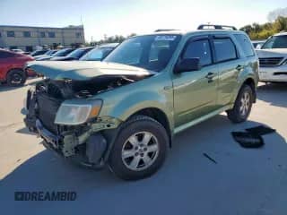 2009 Mercury Mariner with VIN 4M2CU81799KJ01514, listed as a Copart auction lot 82219345 with 392,707 mi miles and Salvage title. Bid and sale history available at DreamBid. Image 1.