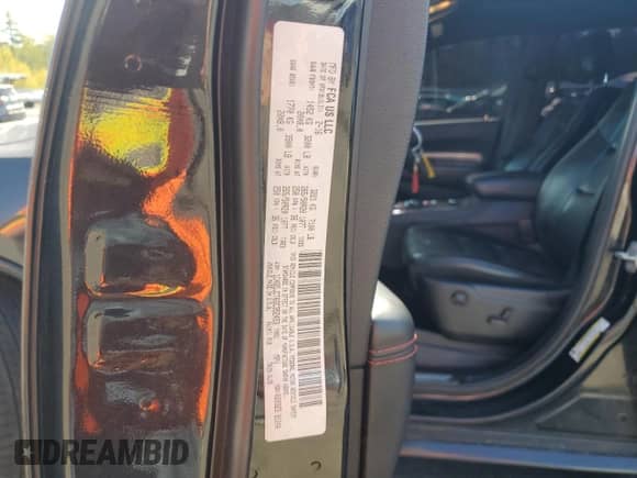 2016 Dodge Durango R/T with VIN 1C4SDJCT6GC352453, listed as a Copart auction lot 84751075 with 171,389 mi miles and Salvage title. Bid and sale history available at DreamBid. Image 13.