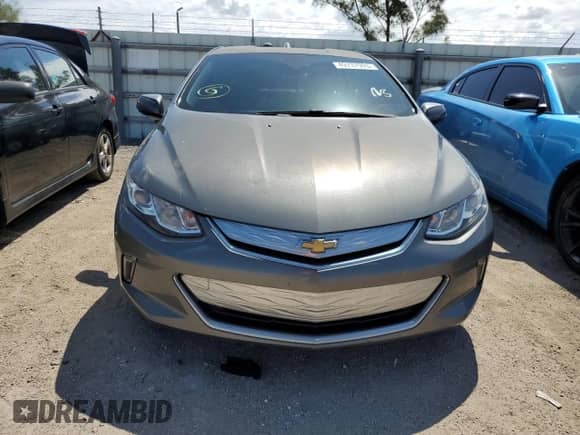 2017 Chevrolet Volt LT z VIN 1G1RA6S53HU169104, wystawiony jako Copart lot #49737903 z przebiegiem Nie podano mil oraz . Historia ofert i sprzedaży dostępna na DreamBid. Obrazek 5.